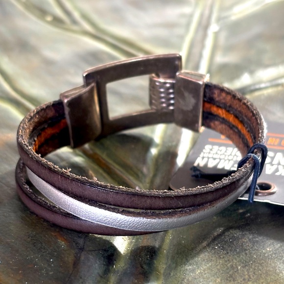 Brown SilverFlat Leather (5MM) Triple Strand
Bracelet with Bronze Toggle Clasp - Picture 4 of 6